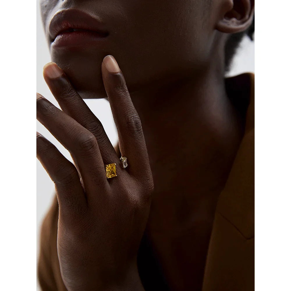 Asymmetrisk Elegant Prisma Ring" in Danish without "LUNVIA" and replacing it with "Rosendal" would be: 

"Rosendal Asymmetrisk Elegant Prisma Ring