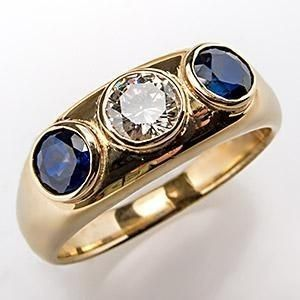 Vintage ring i guld med indlæg af blåt glas og zirkonium I Rosendal